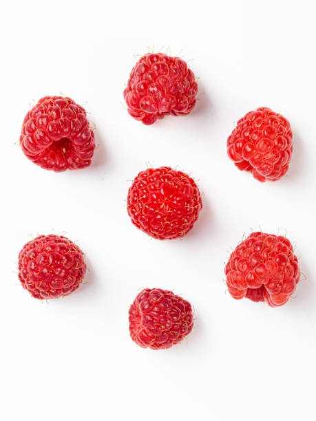 istock set of raspberries isolated on white background 1406656616