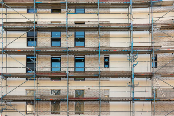 istock Scaffolded, renovated old building facade 1406656998
