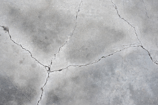 Grunge concrete wall at covered with gray cement old surface