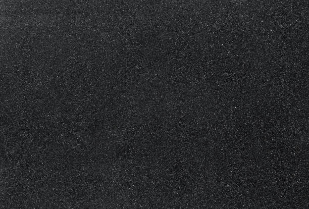 istock Dark stone desk texture with concrete background in high resolution. Top view on a table with copy space. Idea for advertising, banner or product article 1406658204