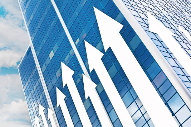 istock Blue modern business background with success rising arrows and sky clouds 1406660606