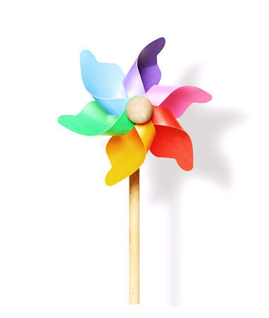 Colored pinwheel or windmill on white background