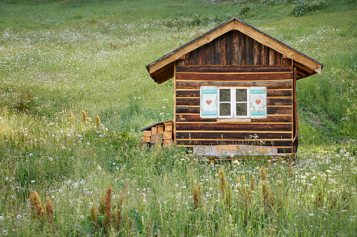 Antique wooden hut, European alps.