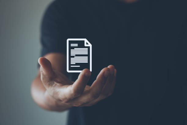 istock Document management system concept, businessman holding a document icon on blur background. Document Management Data System Business Internet Technology Concept. Corporate data management system DMS 1406670139