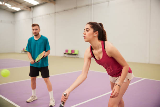 istock A young woman playing pickleball. 1406673480