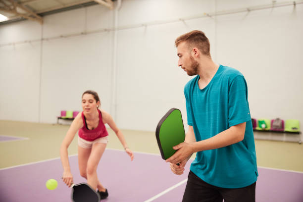 istock Two pickleball players in action. 1406673512