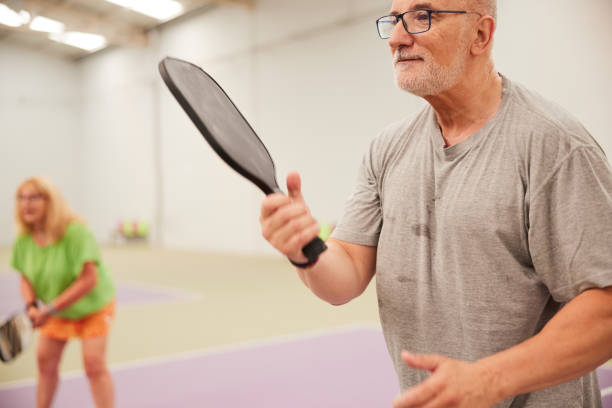 istock Senior adults are playing Pickleball. 1406673720