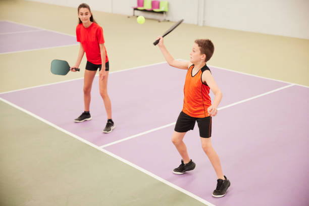 istock Two children play pickleball. 1406673960