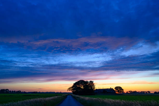 istock Sunset over a rural aerea during a springtime evening 1406674394