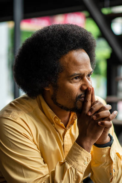 istock African American Businessman Contemplating and Thinking 1406676054