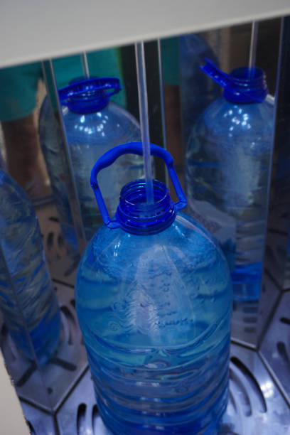 istock Vending machine with fresh water. Pouring clean water into a bottle. 1406676361