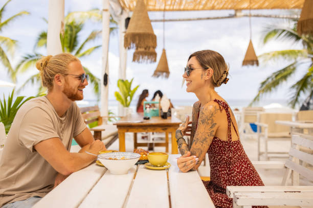 istock At the beach restaurant, Caucasian couple having breakfast 1406677336