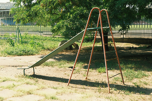 Vintage playground swing in the park