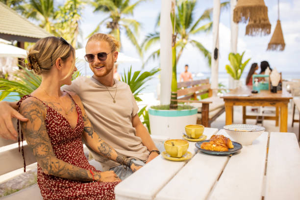 istock At the beach restaurant, Caucasian couple having breakfast 1406678013