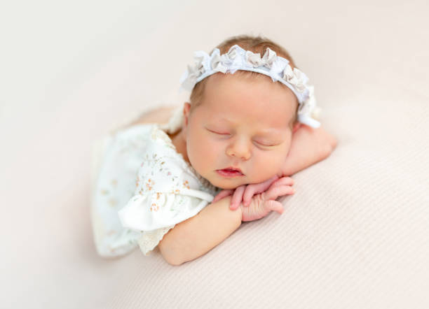 istock Nice newborn resting on stomach 1406678959