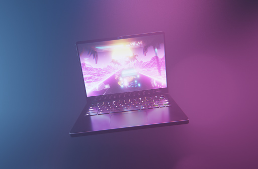 A conceptual gaming laptop for the e-sport gamer on the move. A computer generated 3D render in neon light and moody mist.