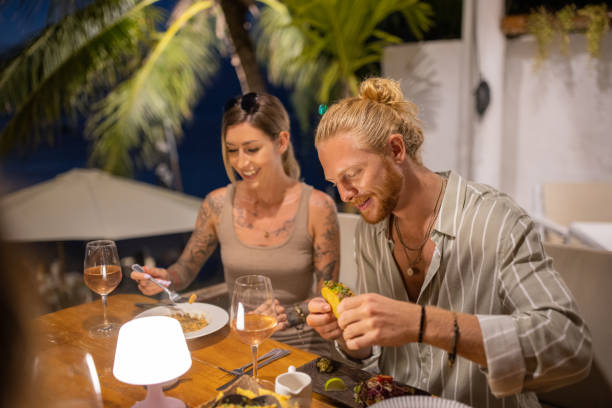 istock Caucasian couple having a dinner at the restaurant during their vacation 1406679360