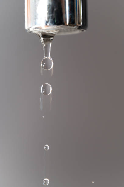Tap from which water flows. stock photo