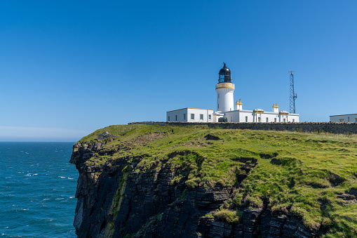 Wick, United Kingdom - 26 June, 2022: view of the Noss Head Lighthouse in Caithness in the Scottish Highlands
