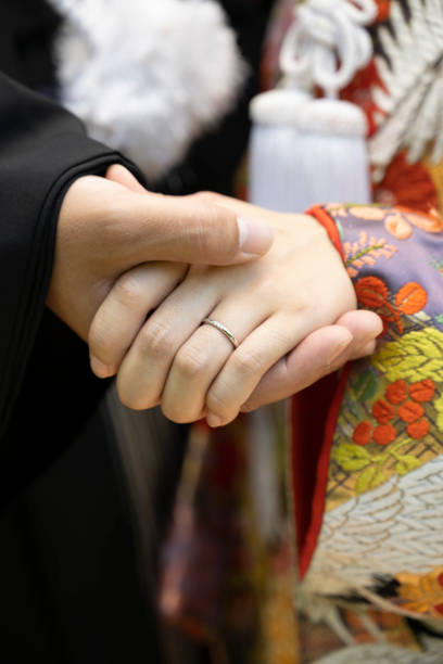 I took a picture of the groom and the bride holding hands.