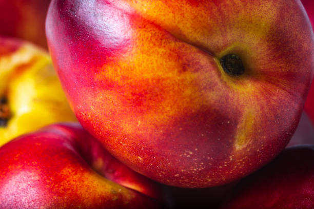 Ripe nectarines fruit background closeup