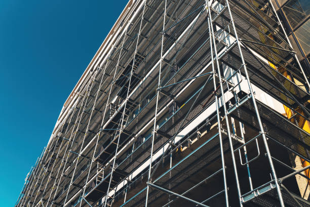 istock Construction site, scaffolding and building. Real estate development industry. 1406685154