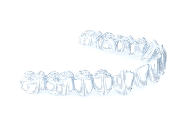 istock Invisalign braces or invisible retainer on white. Medically accurate dental 3D illustration 1406686389