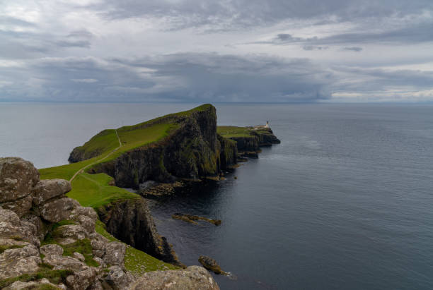 istock view of Neist Point on the Minch and the lighthouse on the cliffs 1406687461