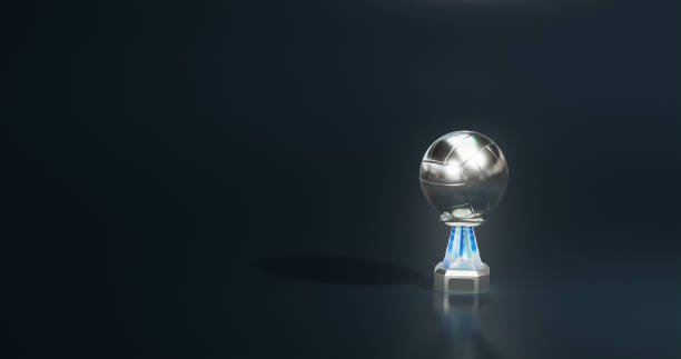 istock Shiny Volleyball Silver Trophy with a Dark blue background 1406688259