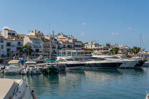 Portopetro, Spain; june 25 2022: General view of the royal yacht club of Portopetro at sunset on a sunny summer day. Island of Mallorca, Spain