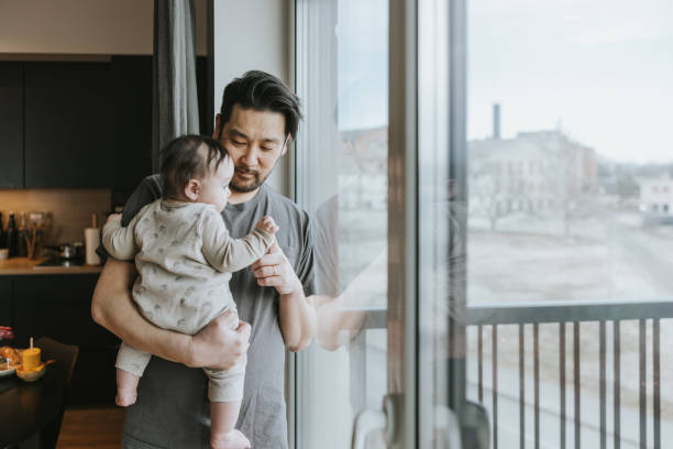 istock Father and baby daughter spending time together 1406693017