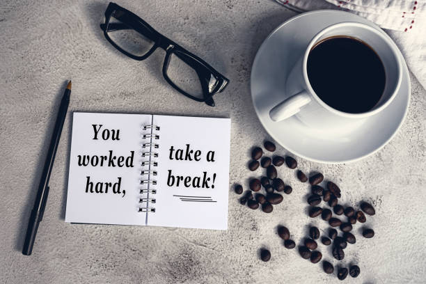 istock Inspirational quote on notepad with coffee and coffee been background. 1406694545