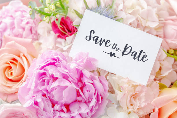 istock Save the date card on blossom wedding flower bouquet 1406696216