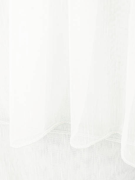 istock Tulle curtains white and yellow texture 1406697251