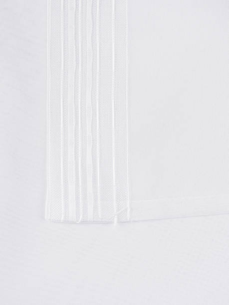 istock Tulle curtains white and yellow texture 1406697289