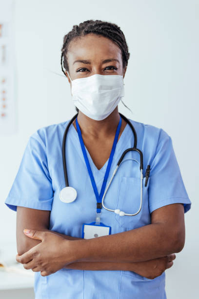 istock Happy nurse working at the hospital 1406698290