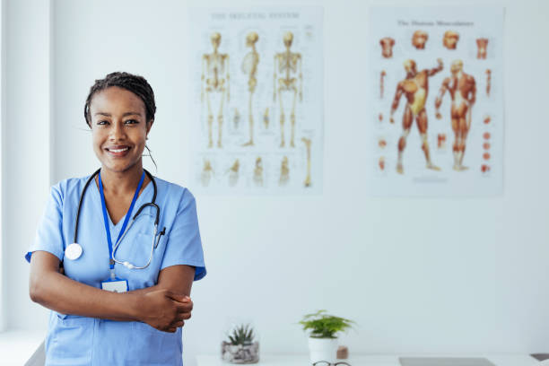 istock Cheerful Young Nurse in Blue Scrubs 1406698297