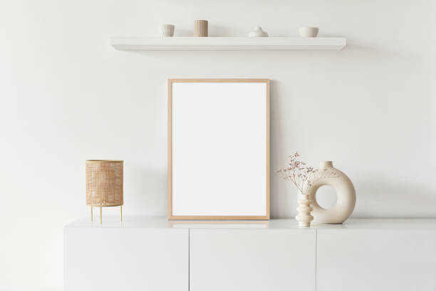 istock Artwork mock-up in interior design. Blank picture frame on a wall 1406700141
