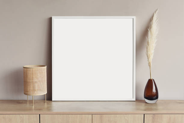 istock Artwork mock-up in interior design. Blank picture frame on a wall 1406700161