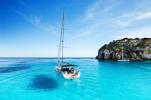 Sailing boat yacht in the sea, yachting, sailing, travel and active lifestyle concept. Majorca island, Spain