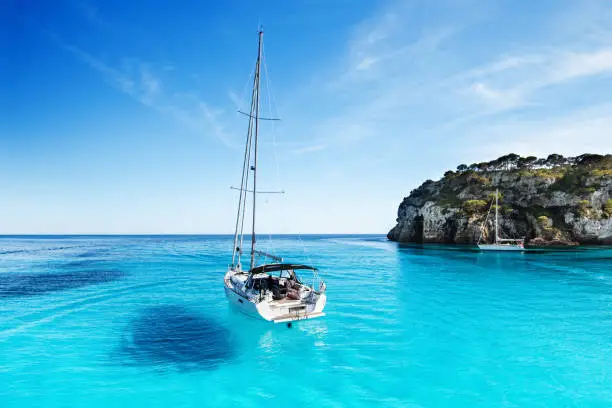 Photo of Sailboat in beautiful Mediterranean bay