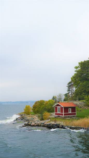 istock Red Log Cabin on Stockholm Archipelago, Sweden 1406704294