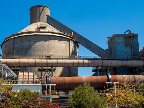 Detail of the machinery of a cement factory.