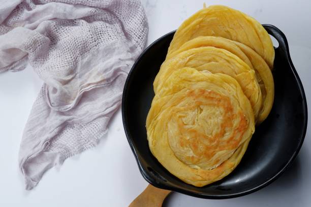 istock canai flat bread ,paratha or porotta 1406716133