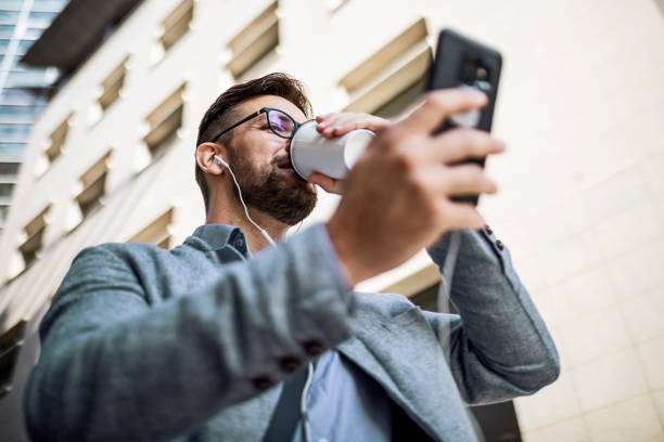 istock Video call on smart phone during coffee break 1406716238