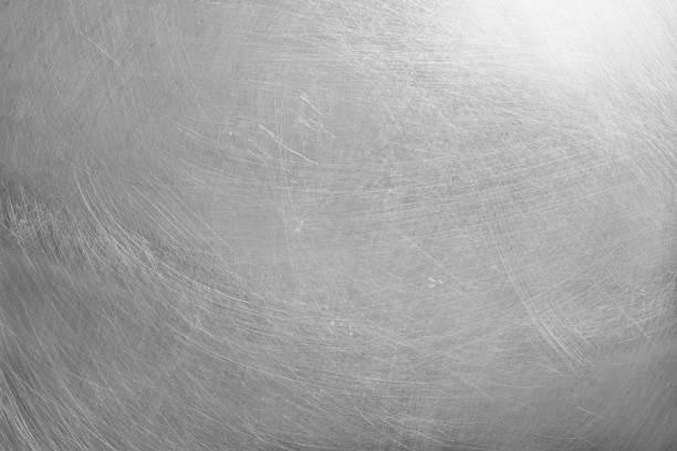 istock texture of old aluminum metal with scratch for background. 1406721920