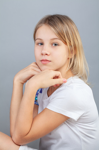 Pretty little girl closeup studio portrait