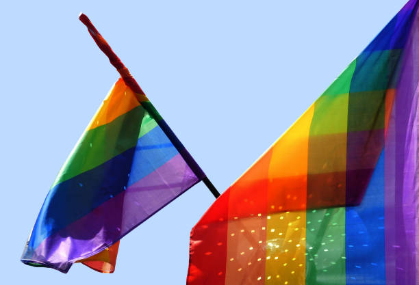 istock Pride rainbow lgbt gay flag being waved on sky background 1406723105