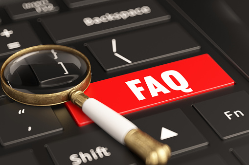FAQ Button with Magnifying Glass on Computer Keyboard. 3D Render
