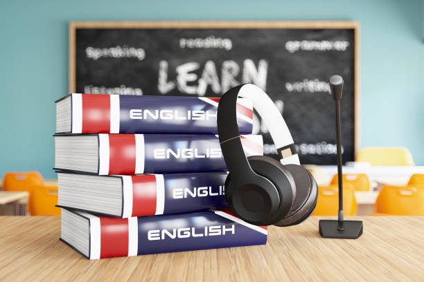 English Learning Concept with Books Headphone Microphone and a Classroom as a Background English Learning Concept with Books Headphone Microphone and a Classroom as a Background. 3D Render Teaching English Abroad stock pictures, royalty-free photos & images